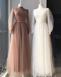 Pastel organza maxi dress with layered design.